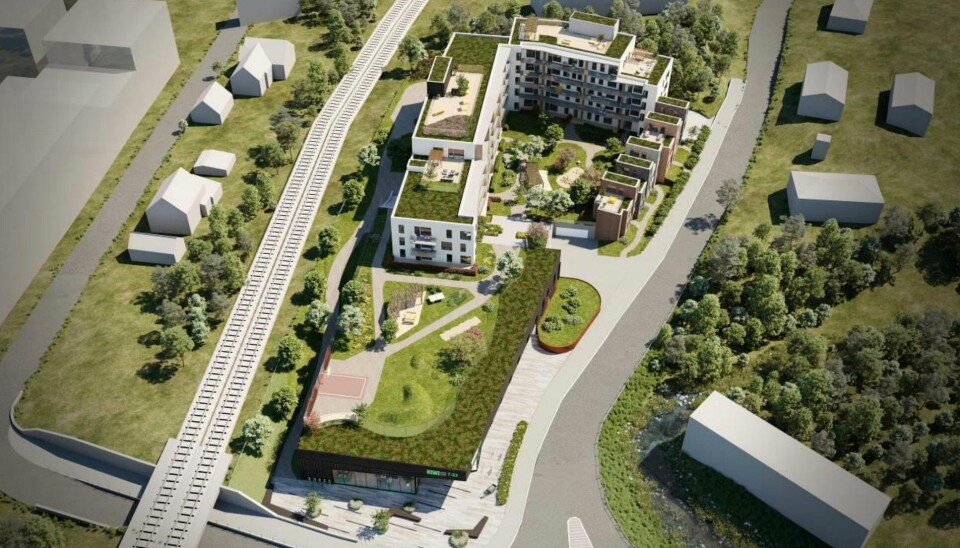 UTVIKLING: Slik så utviklerne for seg prosjektet i 2022, med butikk i front og boliger bak.